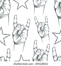 Seamless pattern with Rock n Roll sign and a stars.