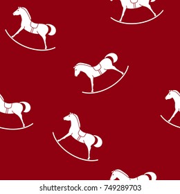 Seamless Pattern with a Rocking Horse , Toy on a Red Background , Vector Illustration  
