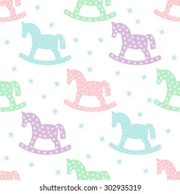 Seamless pattern with rocking horses. Cute baby shower background. Pastel colors child play illustration.