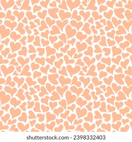 Seamless pattern with romantic hearts. Trendy peach fuzz color. Valentine's day, wedding, mother's day background.