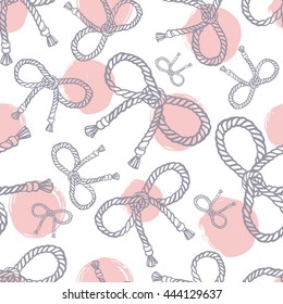 Seamless pattern with rope bows.