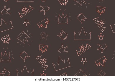 Seamless pattern with rose gold colored crowns. Tiaras are Hand drawn on a dark background. Doodle illustration in vintage style, pop art element, beauty and fashion concept. Creative print. Vector.