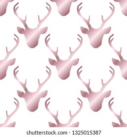 Seamless pattern with rose gold shiny deer heads silhouettes over white. Vector hipster trendy background. Nature wildlife animal backdrop.