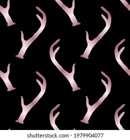 Seamless pattern with rose golden deer antlers. Nature dark vector background. Wildlife animal backdrop in pink gold over black.