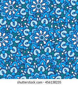 Seamless pattern with round flower mandala in blue colors. Vector illustration
