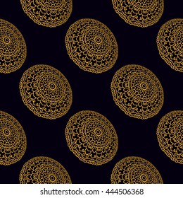 Seamless pattern with round golden mandalas.