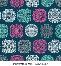 Seamless pattern with round hand drawn mandala. Christmas background.