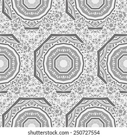 Seamless  pattern of round ornaments and other abstract elements. Can be used to print on fabric, paper, wallpaper and so on.