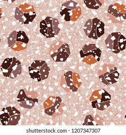 Seamless pattern. Rounded shabby heptagons against the background of diagonally striped squares.