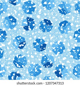 Seamless pattern. Rounded shabby heptagons against the background of diagonally striped squares.
