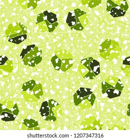 Seamless pattern. Rounded shabby heptagons against the background of diagonally striped squares.