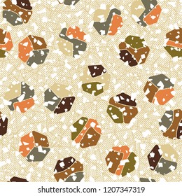 Seamless pattern. Rounded shabby heptagons against the background of diagonally striped squares.