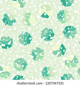 Seamless pattern. Rounded shabby heptagons against the background of diagonally striped squares.