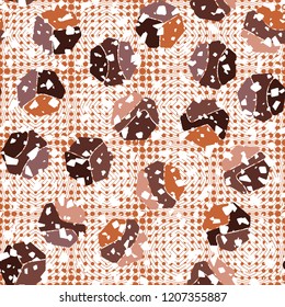 Seamless pattern. Rounded shingled heptagons against the backdrop of concentric shapes and round spots.