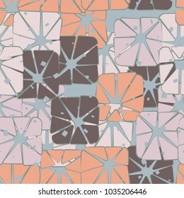 Seamless pattern from rounded squares broken into triangles.
Multi-colored texture. Elegant camouflage.