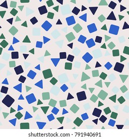 Seamless pattern. Rounded triangles and squares are located chaotically. Spring colors.