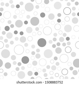 Seamless pattern with roundels and polka dots in different shades of gray. Elegant design for printing on fabric, gift wrapping, covers. Vector illustration
