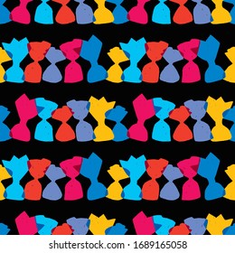 Seamless pattern of rows candies in colorful wrappers