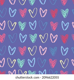 Seamless pattern with rows of hand drawn multicolored heart shapes on Pantone of the 2022 year Very Peri background for gift wrap and other design projects. Love, romance, Valentines Day concept