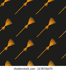 Seamless pattern from rustic brooms. Background from handmade brooms. Halloween concept.