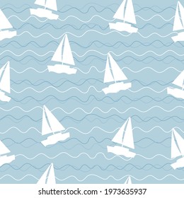  Seamless pattern with sailboats and waves on blue background