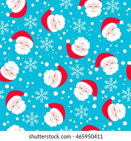 Seamless pattern. Santa Claus on a blue background.