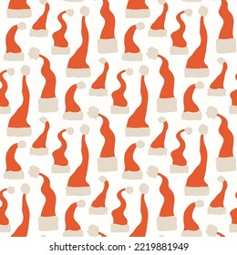 Seamless pattern of Santa hats. Christmas traditional clothes for head.