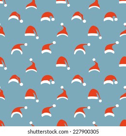 Seamless pattern of Santa hats. Christmas retro background. 