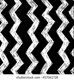 
Seamless pattern in Scandinavian style . Zigzags , vector drawing by hand. Simple stylish background . Black and white.