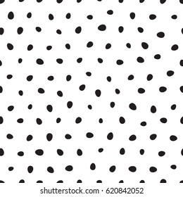 Seamless pattern of scatter black easter eggs on white background. Holiday monochrome background for greeting card, website, printing on fabric, gift wrap, postcard and wallpaper. Vector illustration.