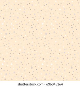 Seamless Pattern of Scattered Stars on Light Orange Background