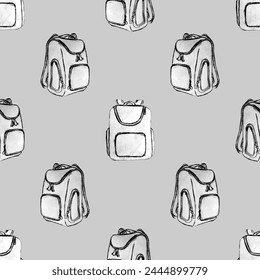 Seamless pattern with school backpacks on a square gray background in doodle style. Sketch of backpacks drawn by hand.