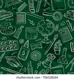 Seamless pattern with school icons.Stationery on a blackboard.Design for lessons, teacher's day, knowledge day.Vector illustration with sketch globe, alarm clock, book, pen, ruler and other stationery