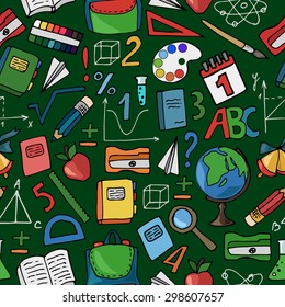 Seamless pattern with school supplies on a green background. Vector illustration