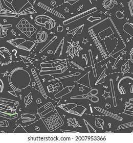 Seamless pattern with school supplies and stationery. Black and white vector illustration. A white outline on a black background. Doodle Style.