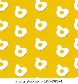 Seamless pattern with scrambled eggs on orange background. Vector illustration