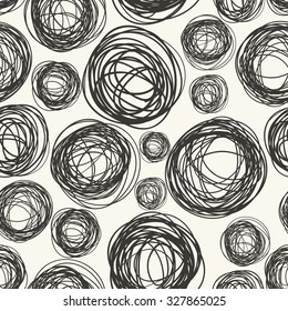 Seamless pattern with scribbles circles.