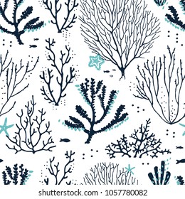 Seamless pattern sea coral reef dark blue and turquoise colors with fishes and starfishes. Vector hand drawn illustration on white background.