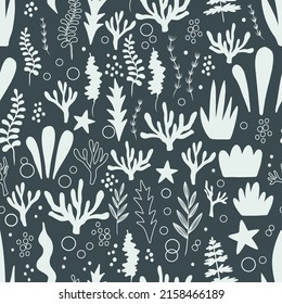 Seamless pattern with sea plants and corals on dark blue background. Sea digital background with vector hand drawn elements. Seamless pattern for kids fabric, textile and scrapbook paper.