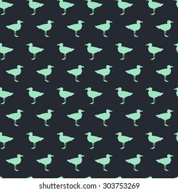 Seamless pattern with seagull silhouettes. Bird tiling background.