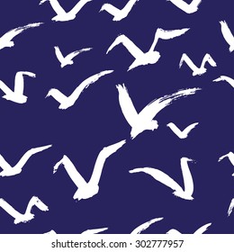 Seamless  pattern with seagulls. Hand drawn background.