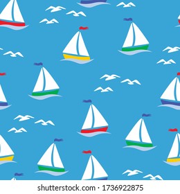 Seamless pattern with seagulls and sailboats. Vector illustration  on a blue background.