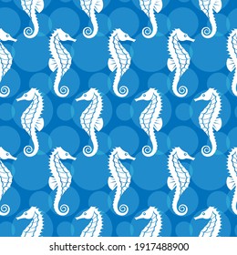 seamless pattern with seahorse isolated on blue background