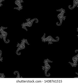 Seamless pattern of seahorses isolated on black background. Hand drawn seamless illustration. Outline.
