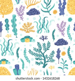 Seamless pattern with seaweeds and corals