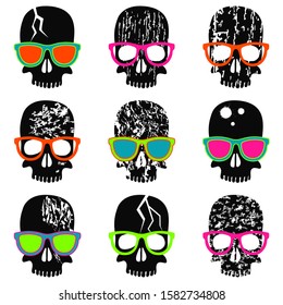 Seamless pattern. Set of skulls with different textures. Black skulls in multi-colored glasses on a white background. Vector illustration