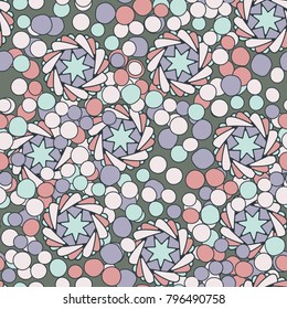 Seamless pattern of seven-pointed stars, round spots and vortex rings.