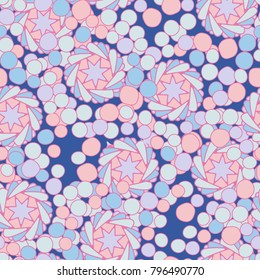 Seamless pattern of seven-pointed stars, round spots and vortex rings.