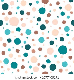 Seamless pattern with shabby circles and dots of blue and beige colors. Kaleidoscope background. Decorative wallpaper. Paper or fabric print. Polka dot ornament. Vector illustration.