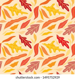 Seamless pattern with shades of red, orange and yellow nature shapes exotic leaves. Autumn colors of nature. Modern vector illustration in flat style for wrapping paper, wallpaper, textile